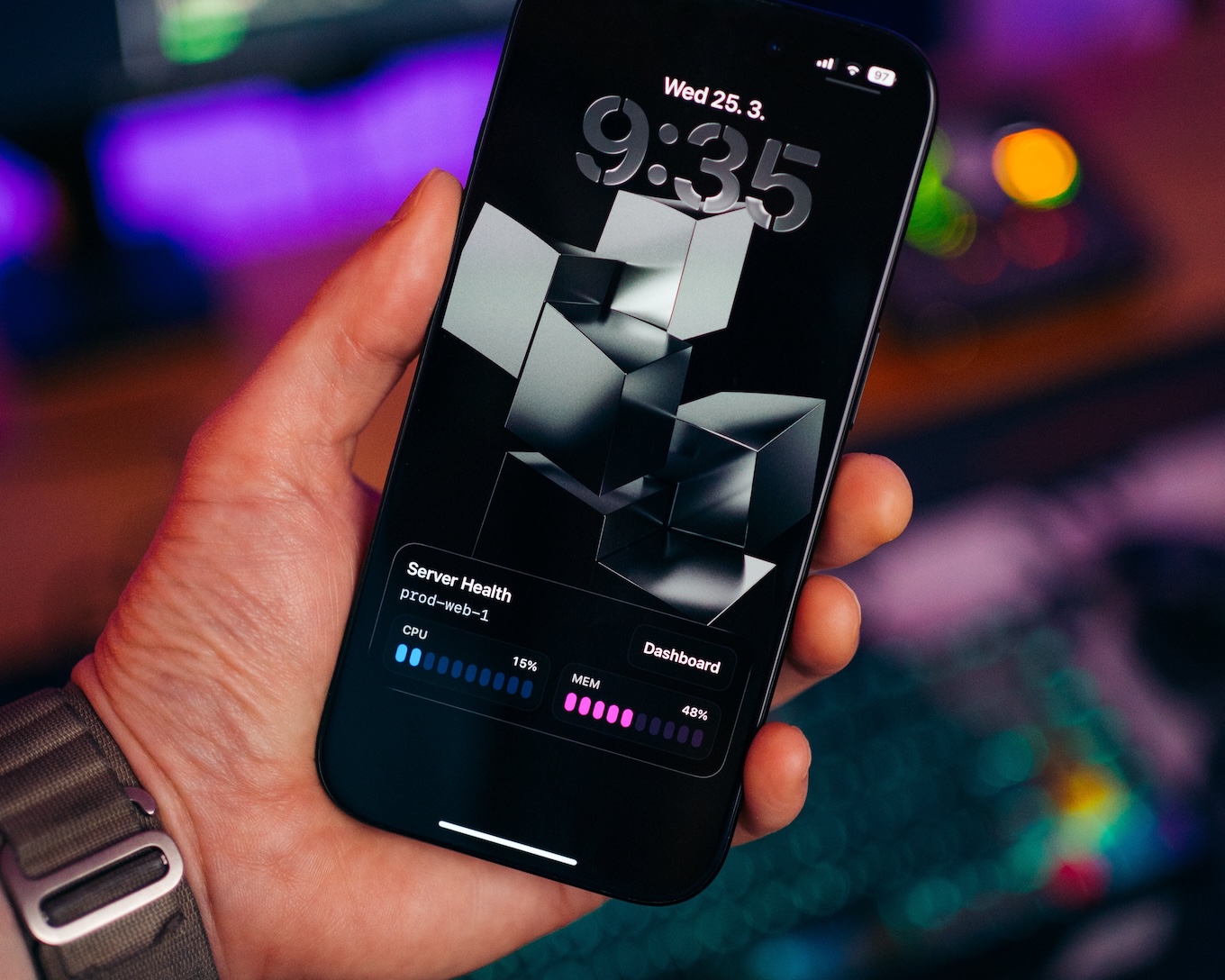 Metrics Live Activity showing VPS CPU and memory on iPhone
